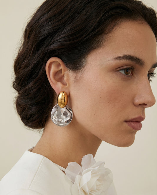 Bold and sculptural, Drop Earrings wear on ear
