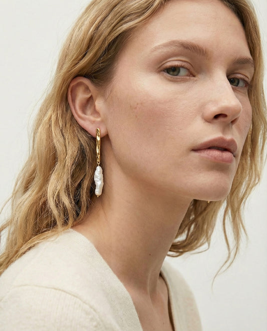 Maris Pearl Drop Earrings worn on ear