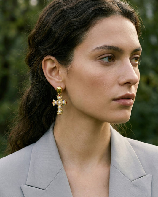Ravenna Pearl Cross Earrings on ear