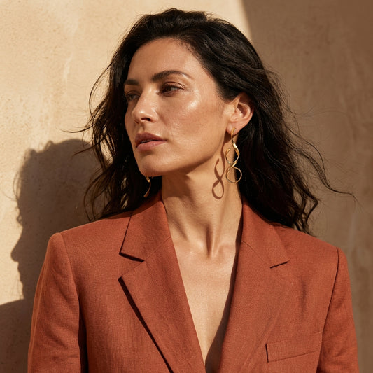 Tide Sculptural Drop Earrings by Clarabelle worn by model