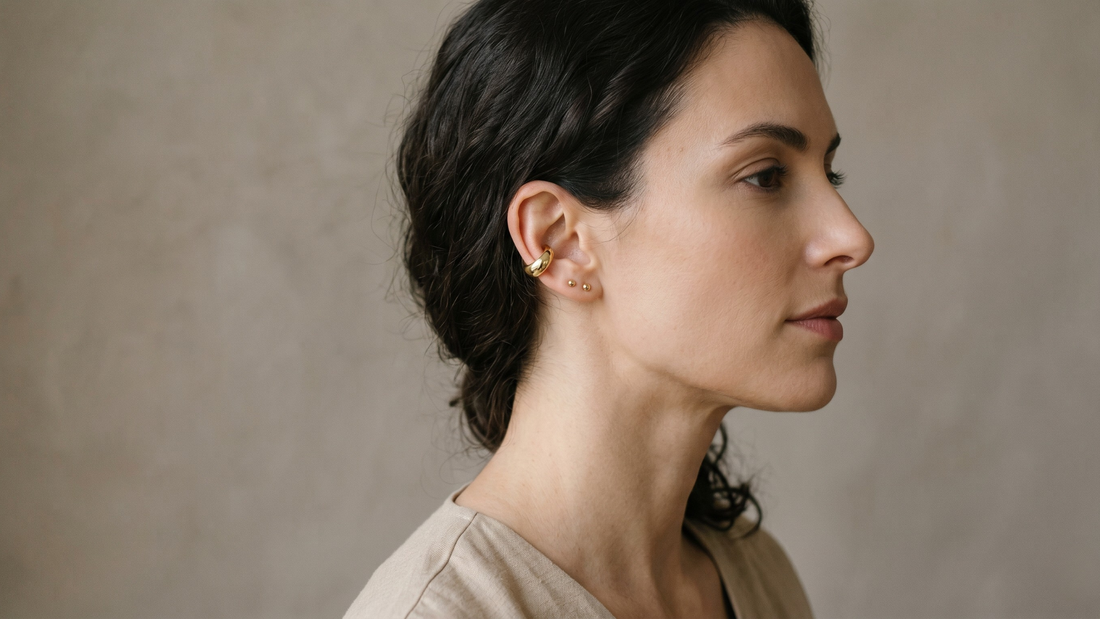 Woman wearing gold ear cuff side profile — ear cuffs for every face shape guide