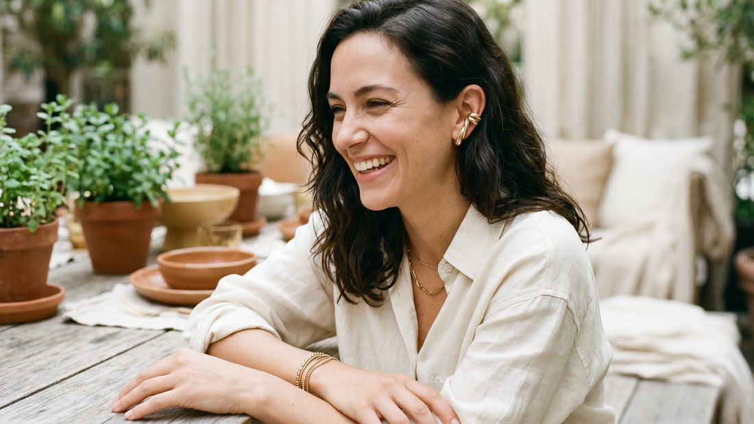 Woman wearing gold ear cuff naturally — are ear cuffs comfortable all day wear guide by Clarabelle