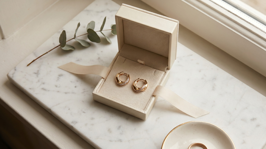 Gold earrings in gift box — complete earring gift guide for every woman and budget