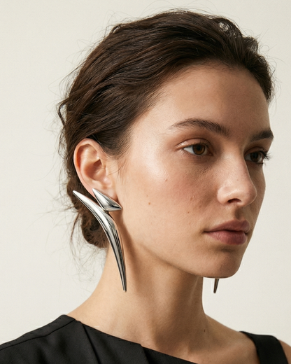 Alfama Drop Earrings in silver on ear
