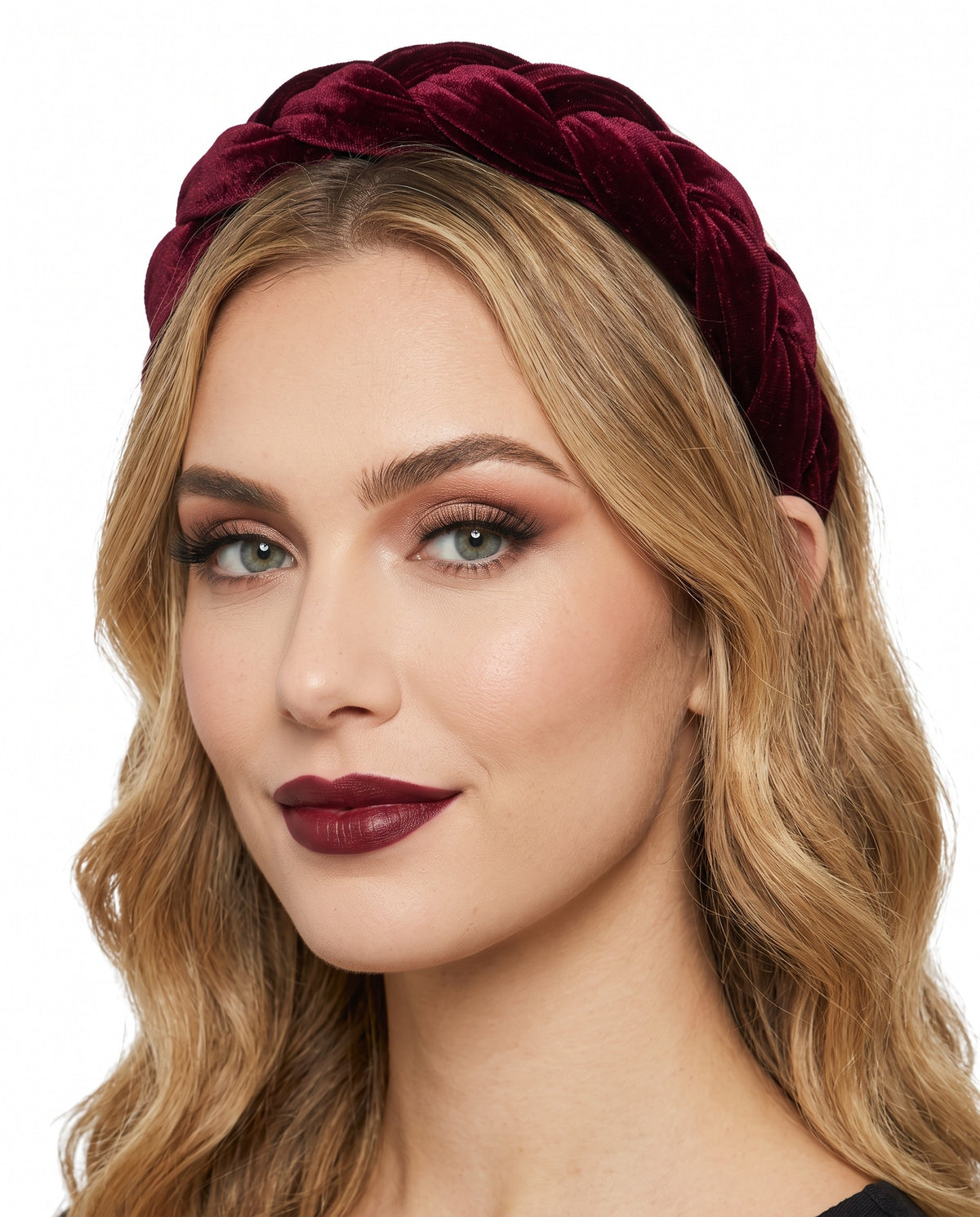 Model wearing the Blair wine velvet headband with hair down, three-quarter view