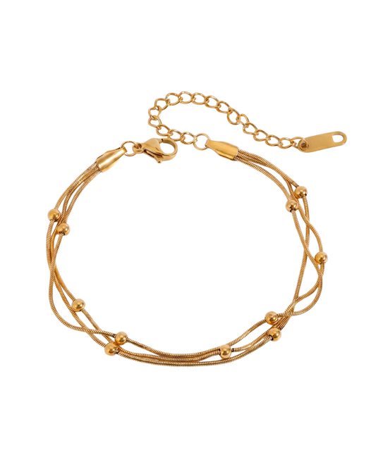 Gold electroplated stainless steel triple layer snake chain bracelet with ball bead accents 