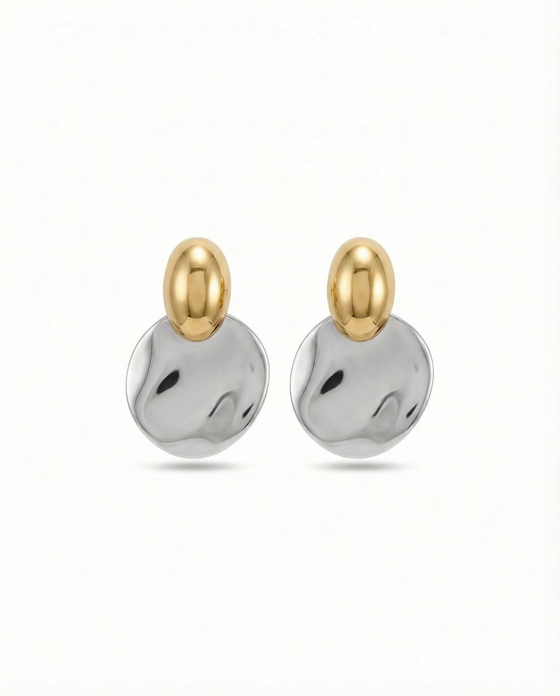 Bold and sculptural, the Capri Drop Earrings 