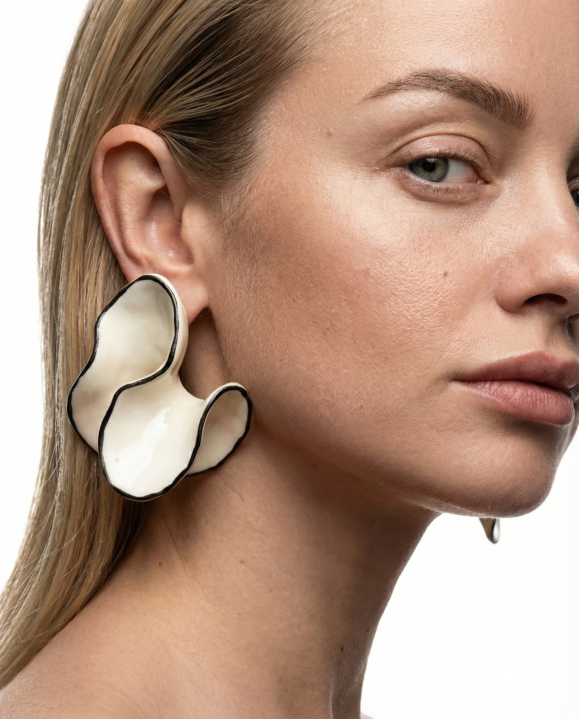Dhalia Petal Earrings on ear
