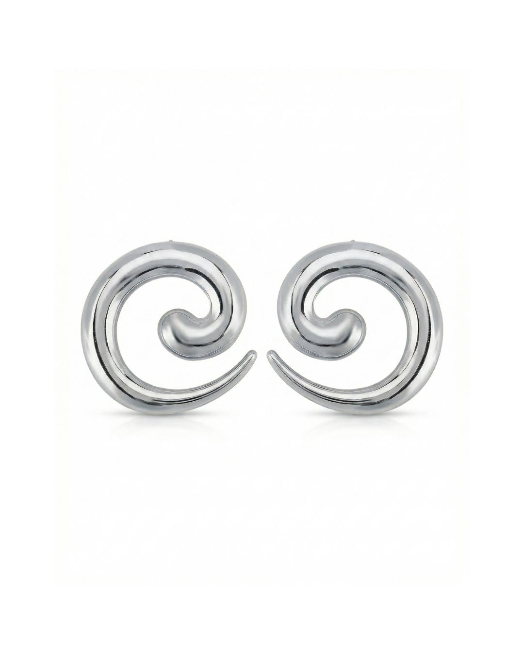 Dunia Earrings in silver on a luxury background