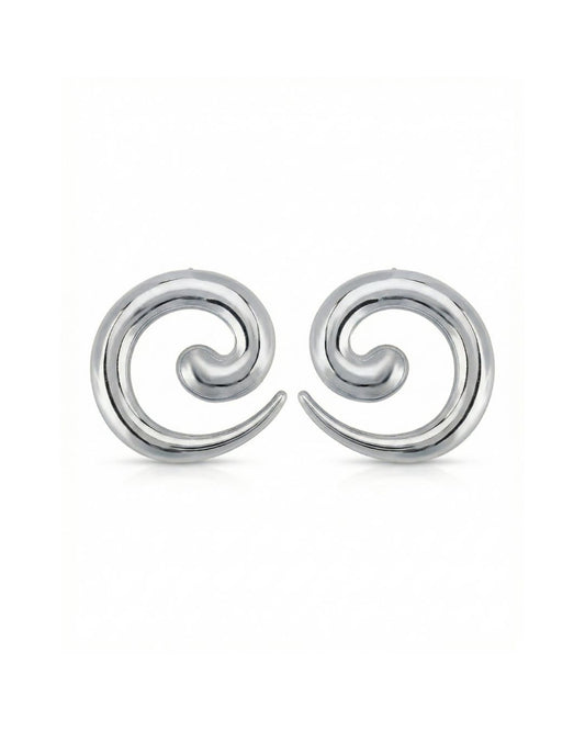 Dunia Earrings in silver on a luxury background