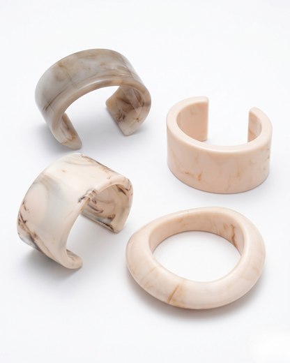 Handmade resin marble bangle bracelets in white, beige and light brown minimalist circular design by Clarabelle