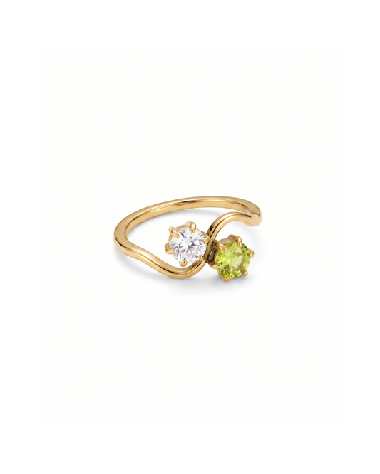 Joséphine Toi et Moi ring by Clarabelle, gold finish with peridot-green and clear crystal-set stones