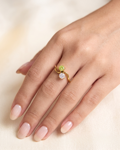 Joséphine ring worn on the finger, bypass band with two crystal stones sitting close
