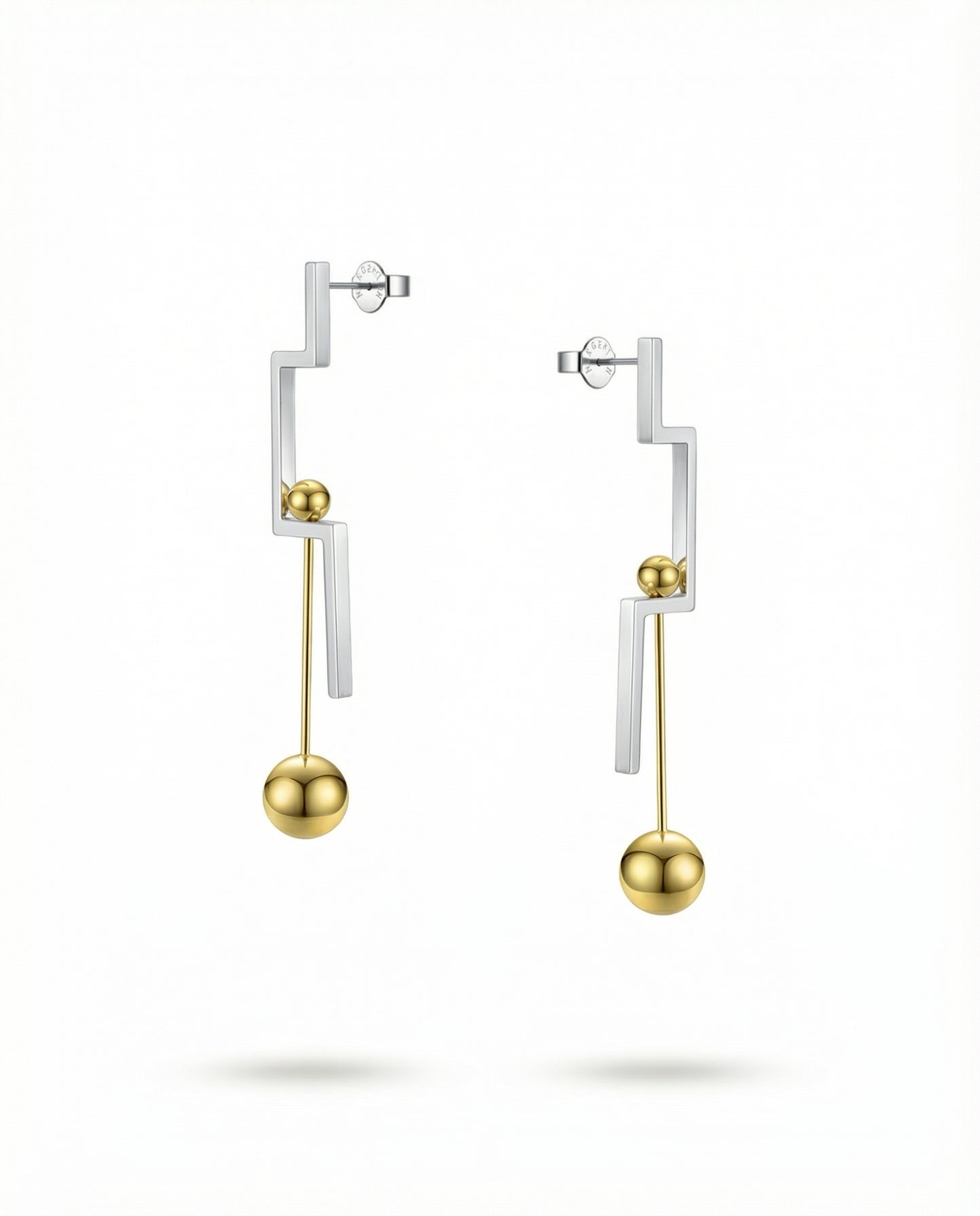 Naxos Geometric Drop Earrings on a white background