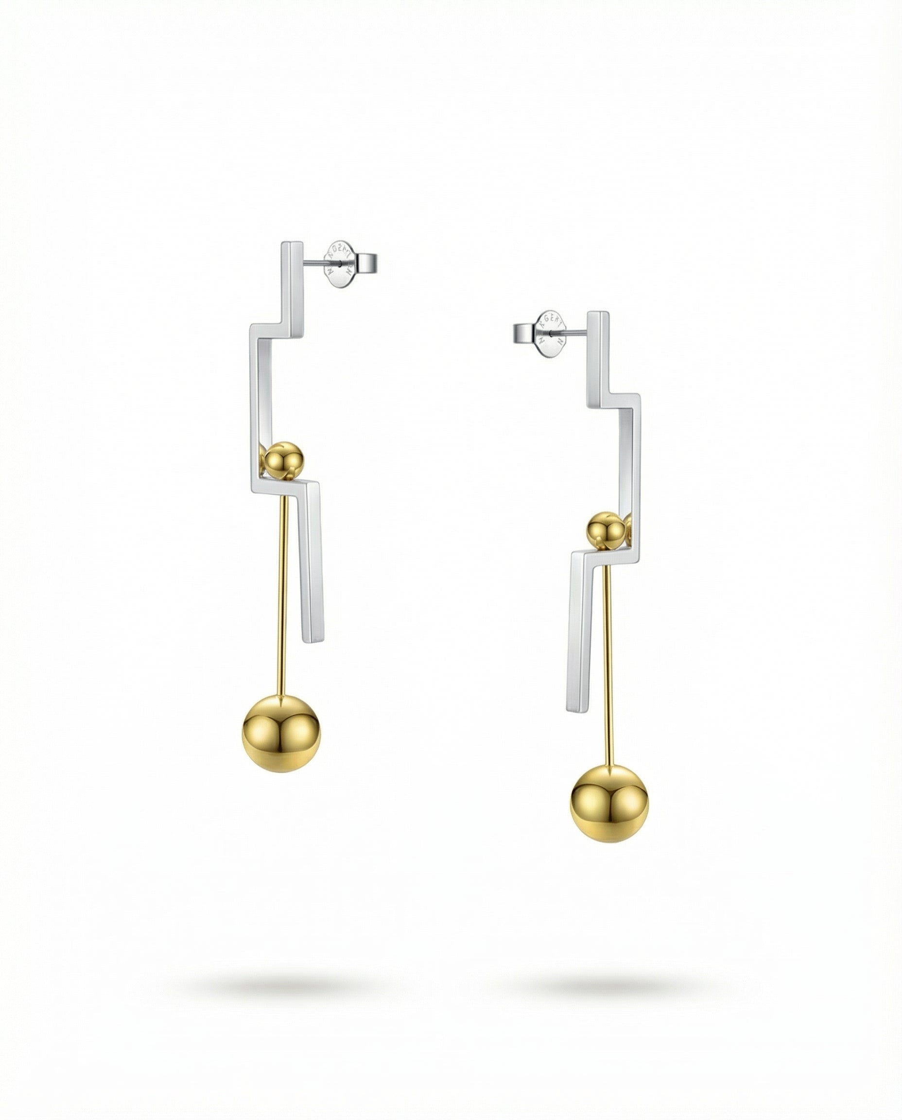 Naxos Geometric Drop Earrings on a white background