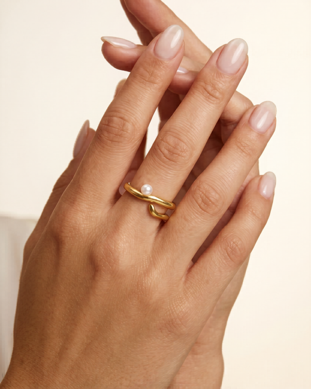 the Perle Ring features an adjustable open band that fits most ring sizes with effortless ease