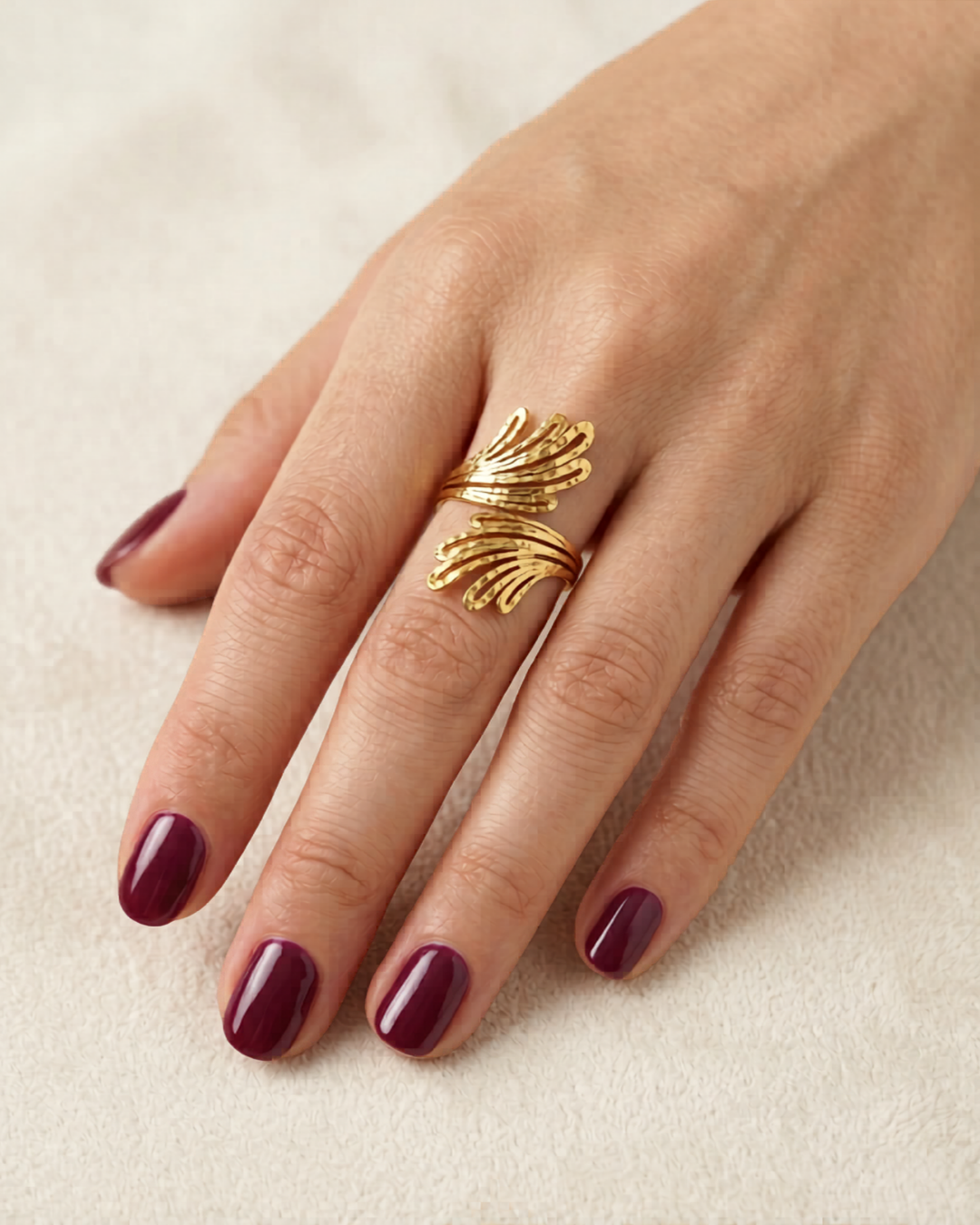 The Plume Ring by Clarabelle takes inspiration from the effortless grace of a feather in motion