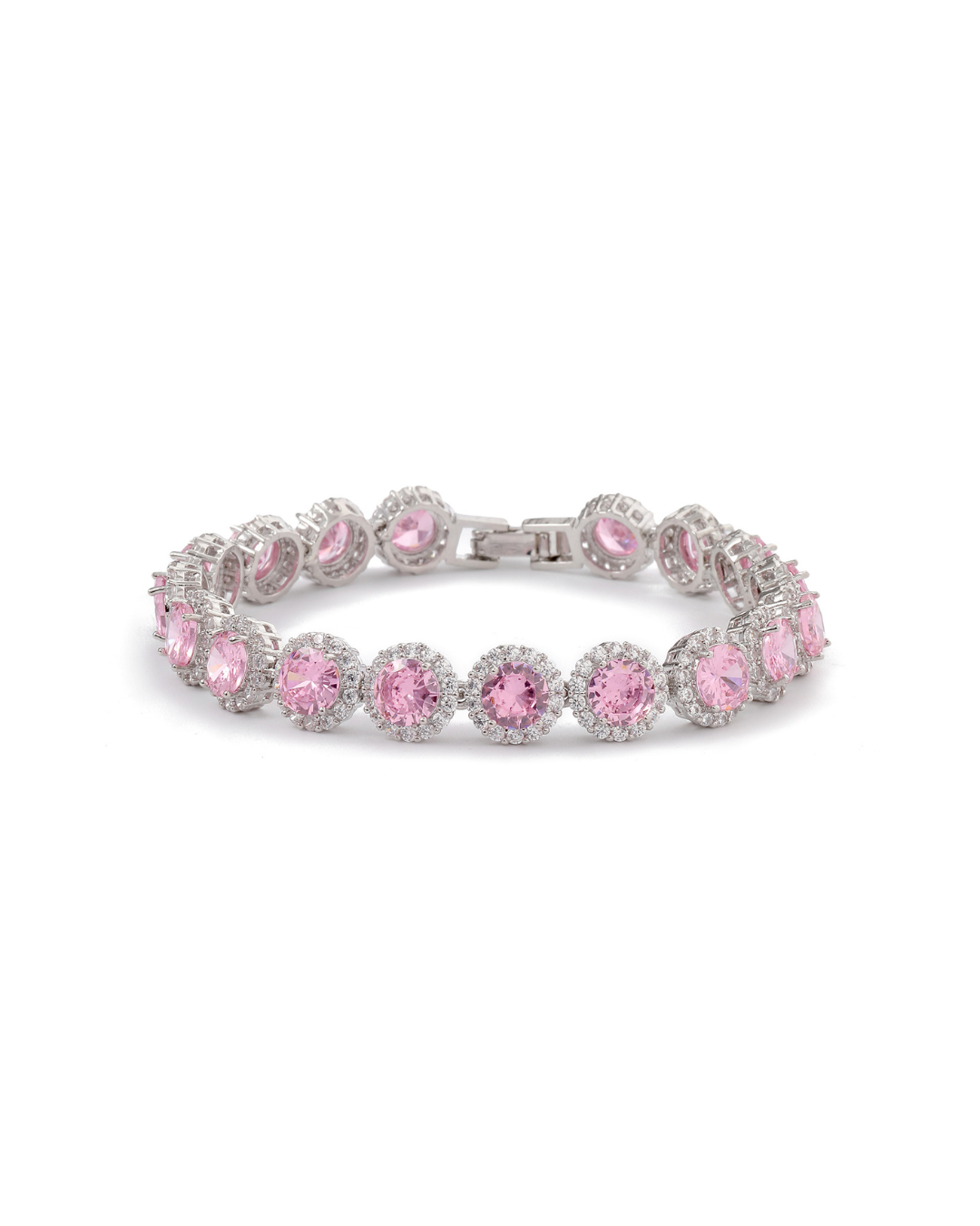 Zaira halo tennis bracelet with round rose pink zircon stones and clear pavé crystal halos on silver-tone plating, laid flat on neutral background