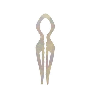 Margot sculpted acetate hair fork in iridescent mermaid white with lyre silhouette and two tapered tines, laid flat on neutral background