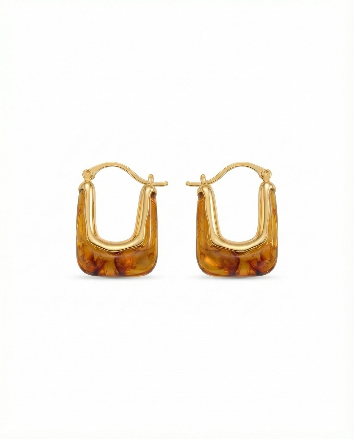modern gold sculptural hoop earrings with marbled resin detail