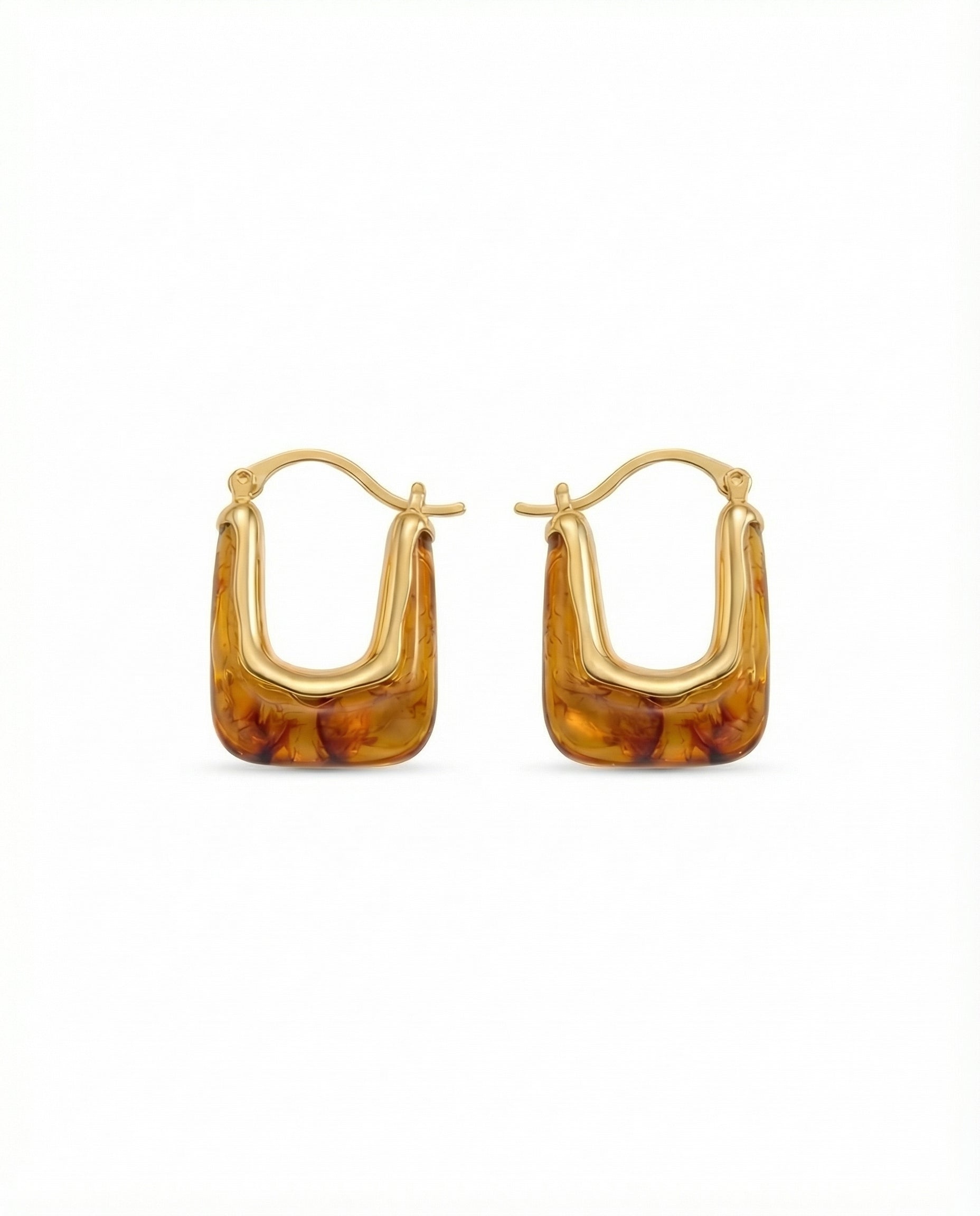 modern gold sculptural hoop earrings with marbled resin detail