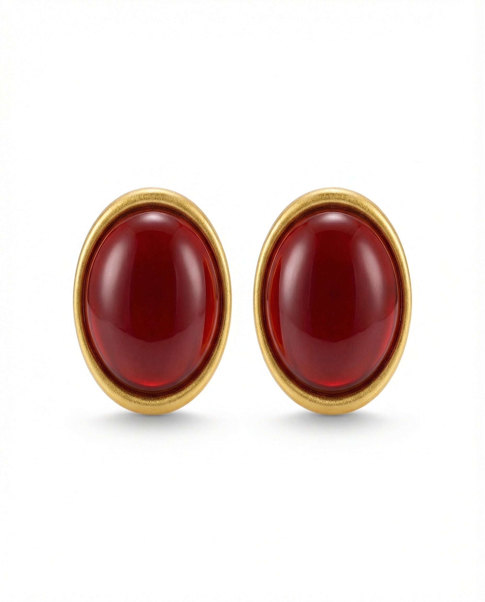 oval statement earrings with domed centre and gold-tone frame
