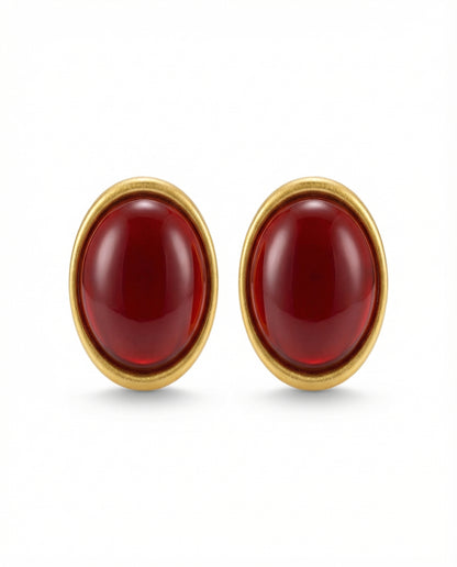 oval statement earrings with domed centre and gold-tone frame